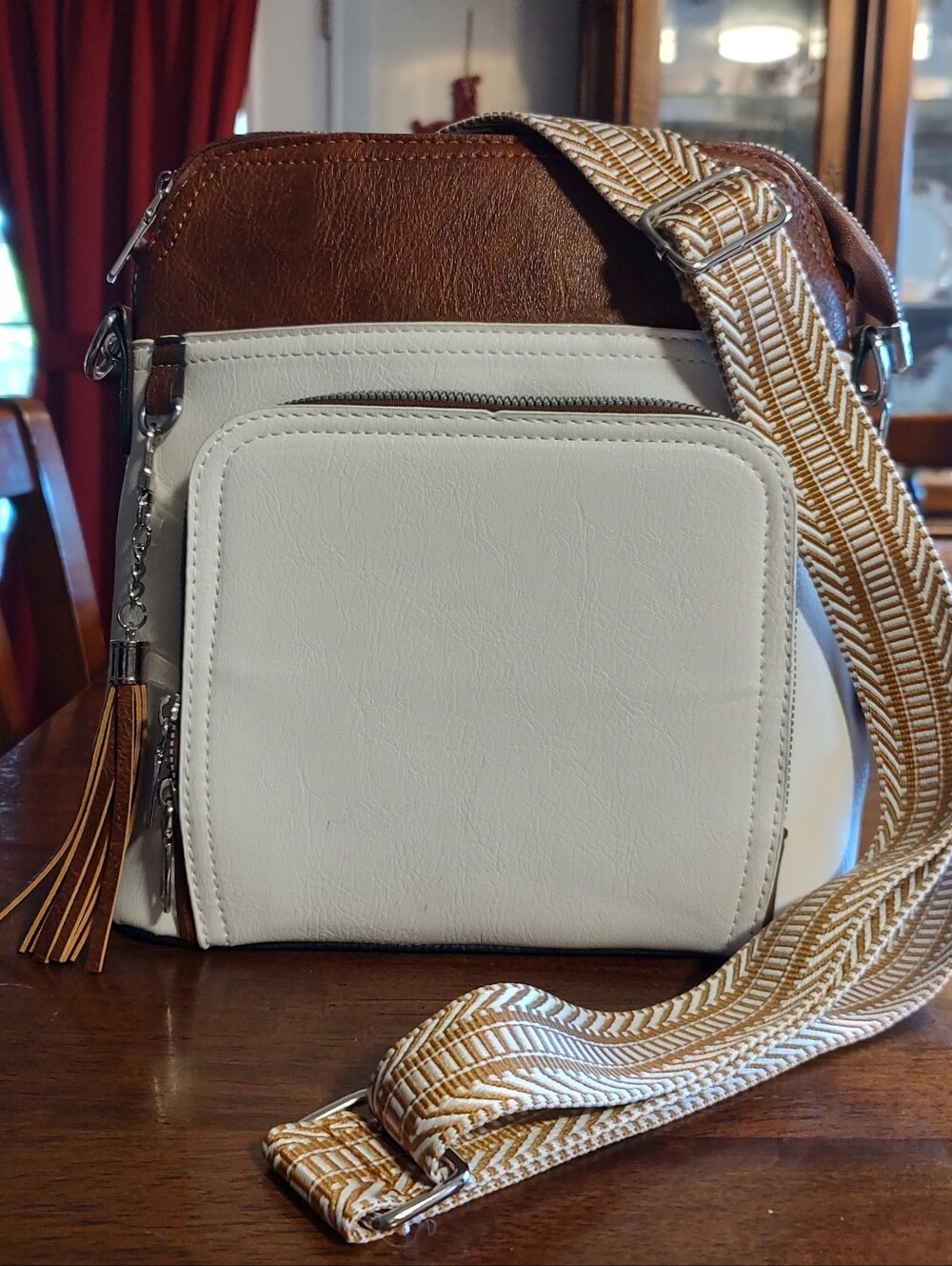 Cream Crossbody Bag with Decorative Brown Strap